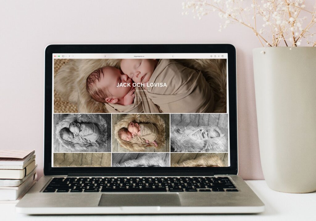 Webbgalleri med nyföddbilder öppet på laptop